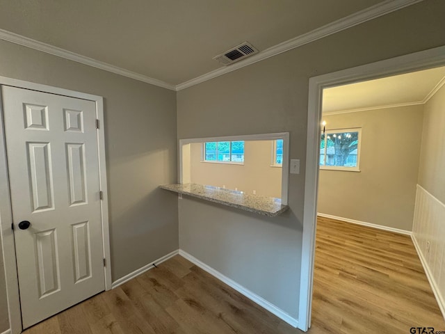 625 Northcrest Dr, Tyler, TX 75702 - spare room featuring wood finished floors and ornamental molding