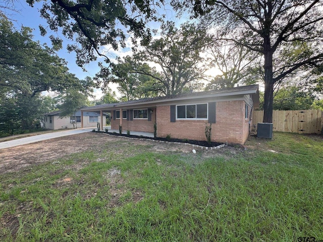 625 Northcrest Dr, Tyler, TX 75702 - ranch-style home with brick siding, a carport, and concrete driveway