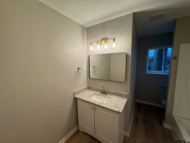 625 Northcrest Dr, Tyler, TX 75702 - bathroom with vanity and wood finished floors