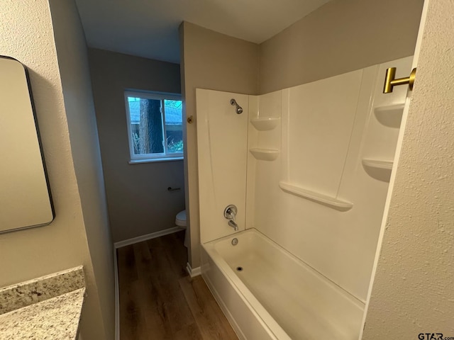 625 Northcrest Dr, Tyler, TX 75702 - full bathroom with wood finished floors, bathing tub / shower combination, and vanity