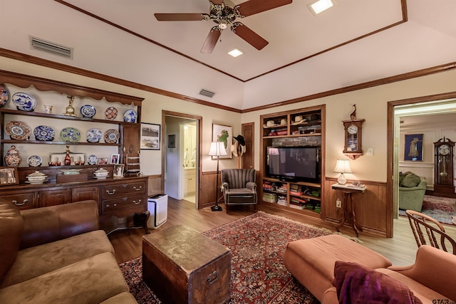 3805 Allendale Dr, Tyler, TX 75701 - living area featuring a ceiling fan, wood finished floors, wainscoting, and lofted ceiling