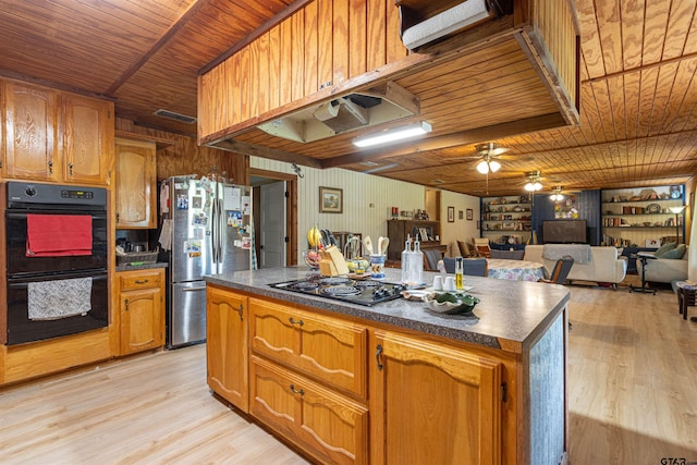 kitchen with wooden ceiling, dark countertops, black appliances, light wood-style floors, and ceiling fan
