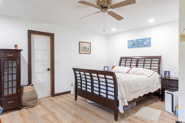 bedroom featuring baseboards, wood finished floors, ceiling fan, and recessed lighting