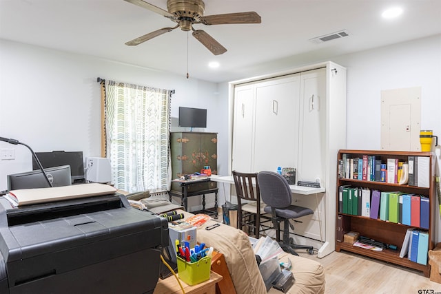 office featuring visible vents, wood finished floors, ceiling fan, and recessed lighting