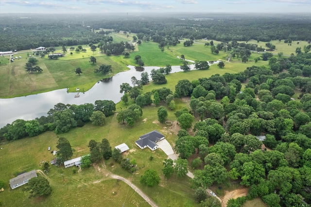 birds eye view of property featuring a water view and a rural view