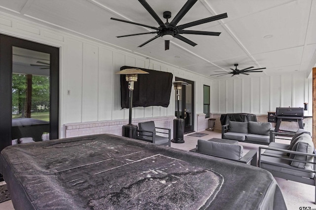 view of patio with ceiling fan