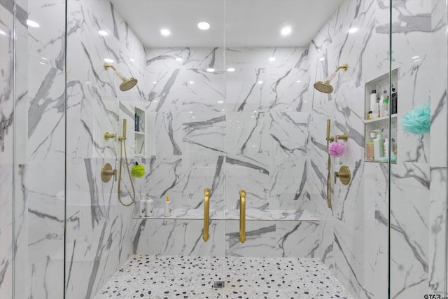 bathroom with tiled shower