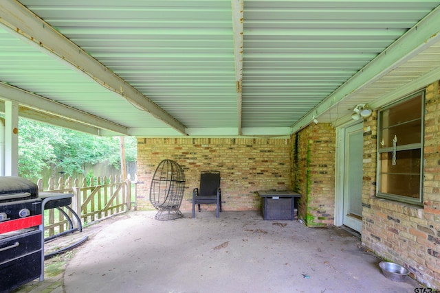 view of patio featuring a grill