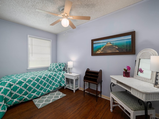1915 Big Eddy Cir, Chandler, TX 75758 - bedroom featuring a textured ceiling, wood finished floors, baseboards, ceiling fan, and crown molding