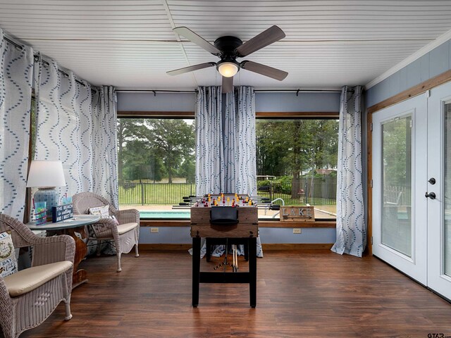1915 Big Eddy Cir, Chandler, TX 75758 - sunroom with healthy amount of natural light, a wooden deck, and wood finished floors