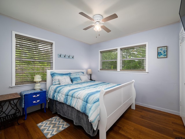 1915 Big Eddy Cir, Chandler, TX 75758 - bedroom with wood finished floors, baseboards, and ceiling fan