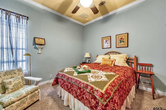 carpeted bedroom featuring ornamental molding and ceiling fan