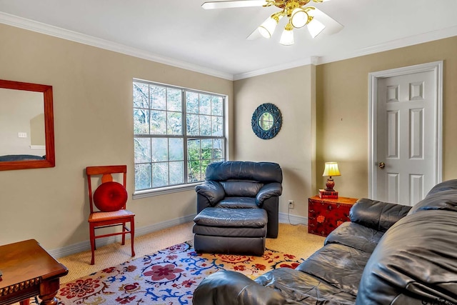 carpeted living room featuring ceiling fan and crown molding