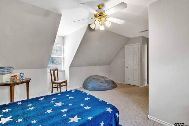 bedroom with carpet floors, ceiling fan, and vaulted ceiling