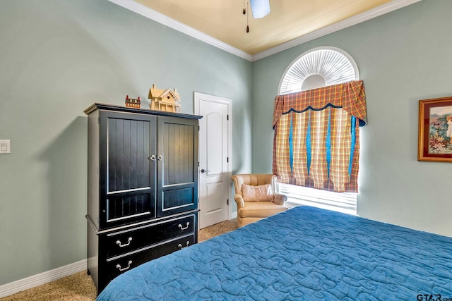 bedroom featuring ornamental molding, carpet floors, and ceiling fan