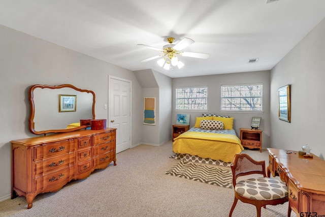 bedroom with ceiling fan and light colored carpet