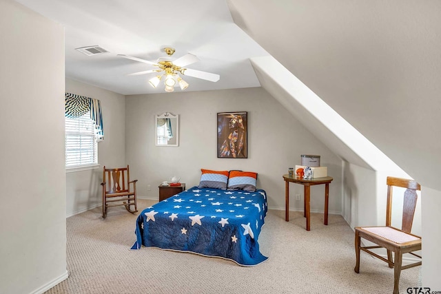 carpeted bedroom with lofted ceiling and ceiling fan