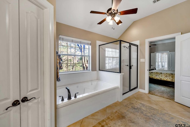 bathroom featuring tile patterned floors, separate shower and tub, vaulted ceiling, and ceiling fan