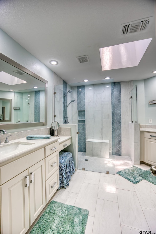 17553 Sleepy Hollow Way, Flint, TX 75762 - bathroom with a marble finish shower, vanity, and recessed lighting