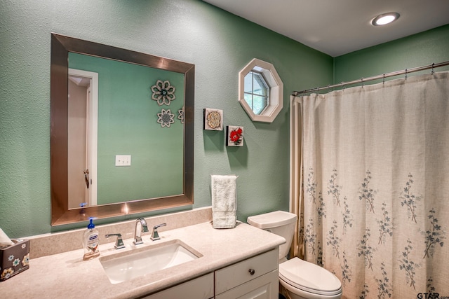 17553 Sleepy Hollow Way, Flint, TX 75762 - bathroom featuring vanity, toilet, a textured wall, and a shower with shower curtain