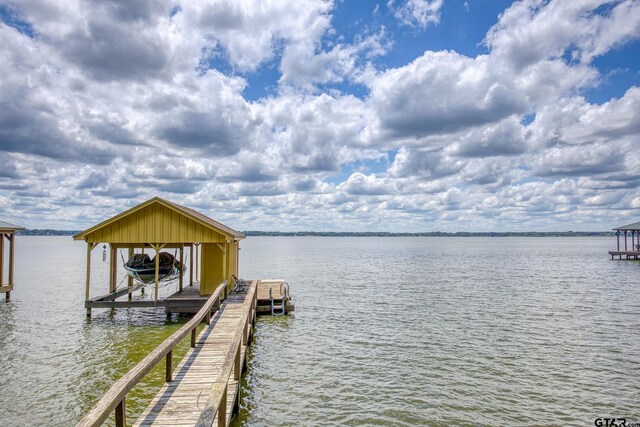 17553 Sleepy Hollow Way, Flint, TX 75762 - dock area with boat lift and a water view