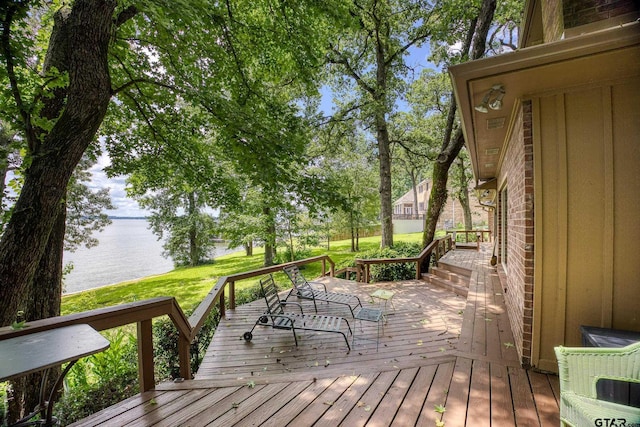 17553 Sleepy Hollow Way, Flint, TX 75762 - wooden terrace with a water view and a yard