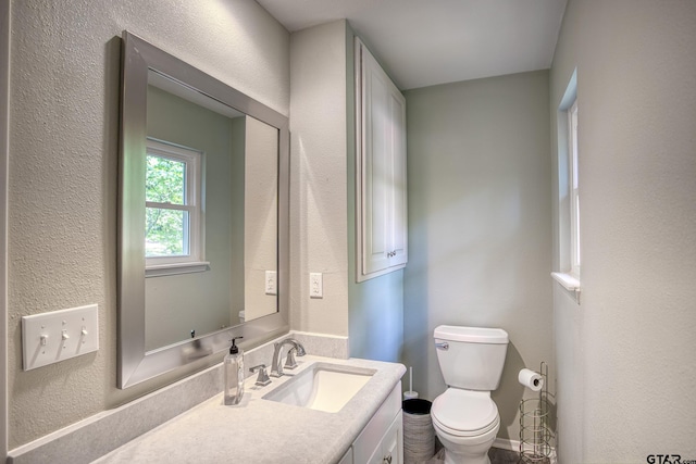 17553 Sleepy Hollow Way, Flint, TX 75762 - bathroom with toilet, vanity, and a textured wall