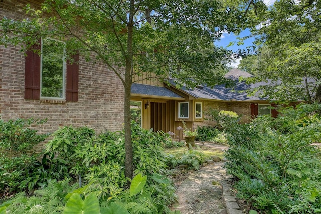 17553 Sleepy Hollow Way, Flint, TX 75762 - view of front facade with brick siding, a shingled roof, and board and batten siding