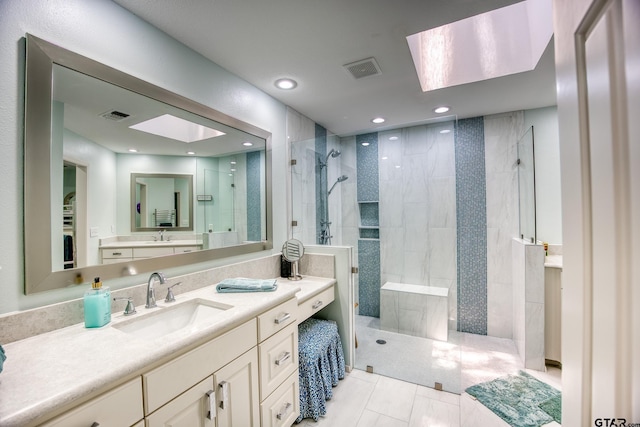 17553 Sleepy Hollow Way, Flint, TX 75762 - full bathroom featuring a skylight, a walk in shower, vanity, tile patterned floors, and recessed lighting