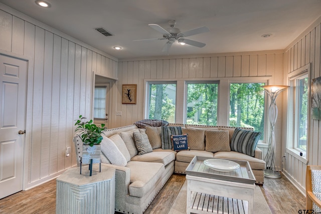 17553 Sleepy Hollow Way, Flint, TX 75762 - living area with plenty of natural light, ceiling fan, light wood finished floors, wood walls, and recessed lighting