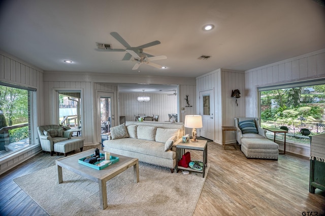 17553 Sleepy Hollow Way, Flint, TX 75762 - living room with a ceiling fan, crown molding, healthy amount of natural light, wood finished floors, and recessed lighting