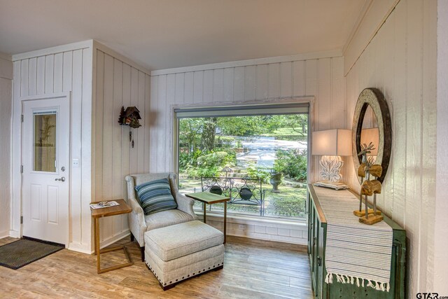 17553 Sleepy Hollow Way, Flint, TX 75762 - sitting room featuring light wood-type flooring and wood walls