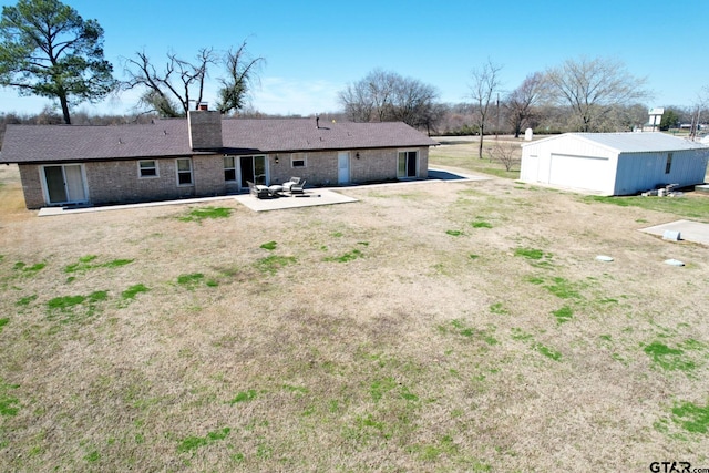 rear view of house featuring a patio