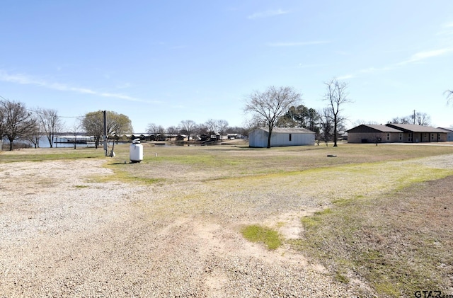 view of yard featuring a water view