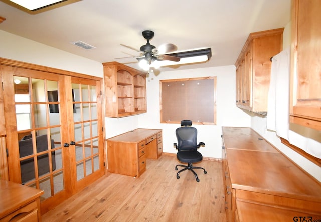 office area with light hardwood / wood-style flooring, french doors, and ceiling fan