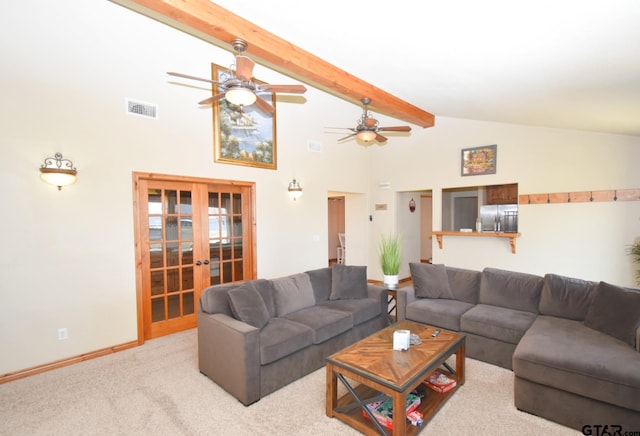 carpeted living room with beamed ceiling, ceiling fan, high vaulted ceiling, and french doors