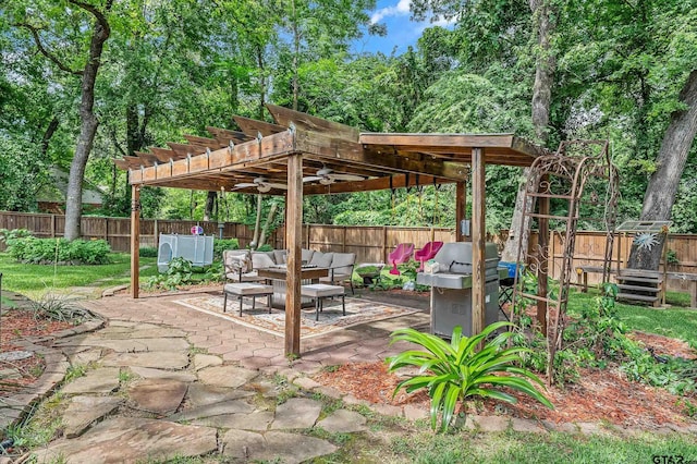 view of patio / terrace featuring a pergola, ceiling fan, a fenced backyard, outdoor lounge area, and area for grilling