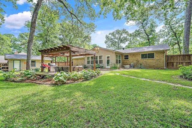 back of property featuring a pergola, a patio area, and brick siding