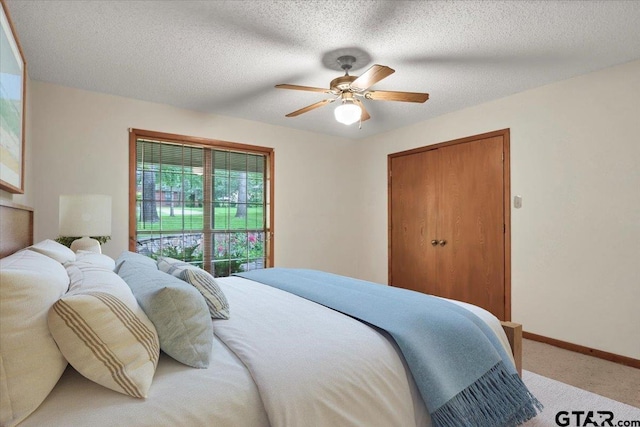 23424BAYSIDE Bay Side Dr, Bullard, TX 75757 - bedroom with carpet, a closet, and ceiling fan
