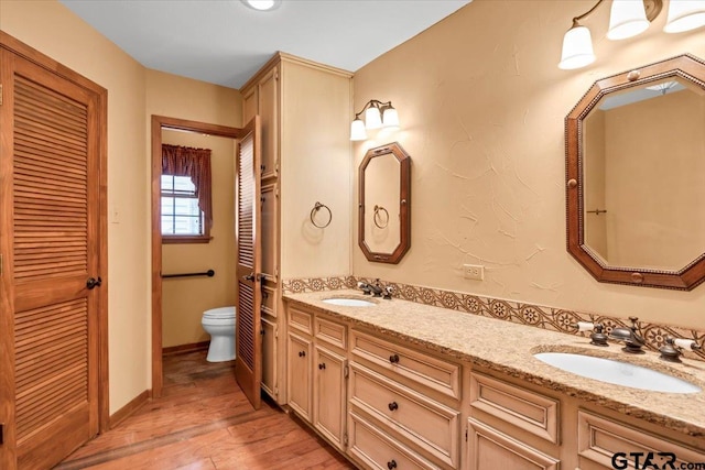 23424BAYSIDE Bay Side Dr, Bullard, TX 75757 - bathroom with double vanity and wood finished floors