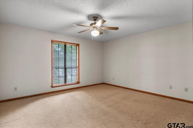 23424BAYSIDE Bay Side Dr, Bullard, TX 75757 - unfurnished room with light carpet, ceiling fan, and a textured ceiling