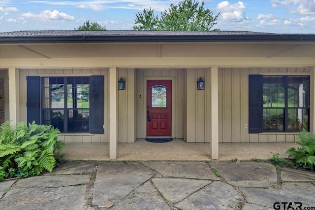 23424BAYSIDE Bay Side Dr, Bullard, TX 75757 - view of exterior entry featuring board and batten siding and covered porch