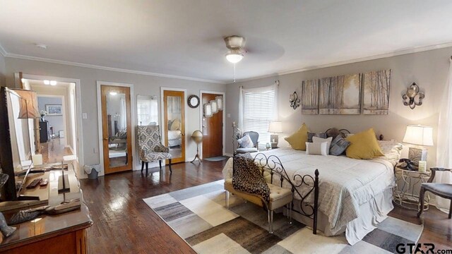 bedroom featuring wood finished floors, crown molding, and ceiling fan