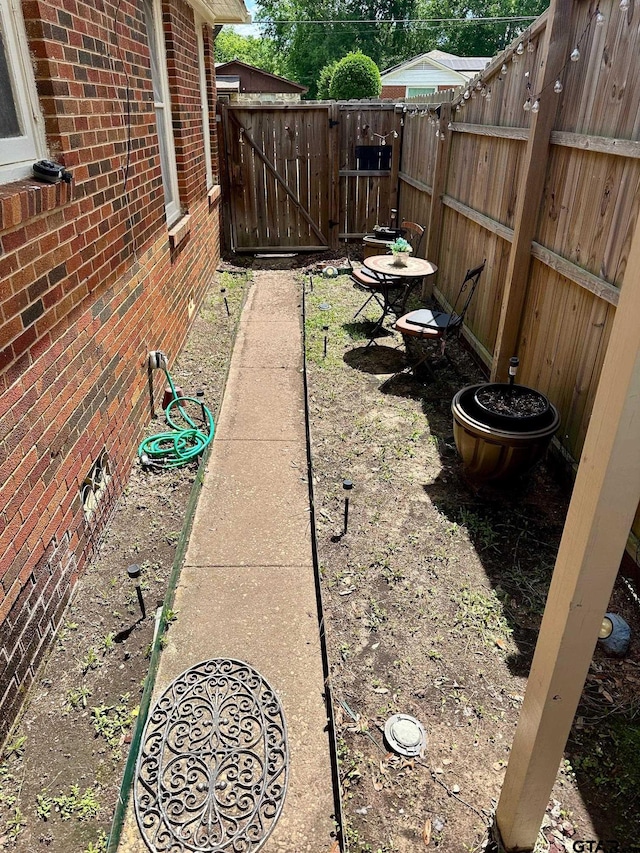 view of yard with fence