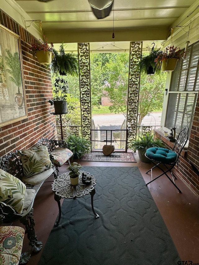 sunroom / solarium featuring plenty of natural light
