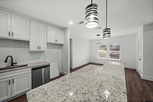 kitchen with white cabinetry, dishwasher, sink, dark hardwood / wood-style flooring, and decorative light fixtures