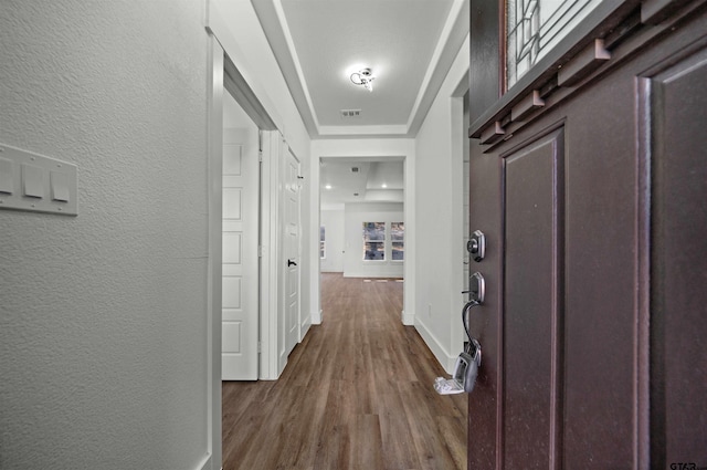 hallway with dark hardwood / wood-style floors