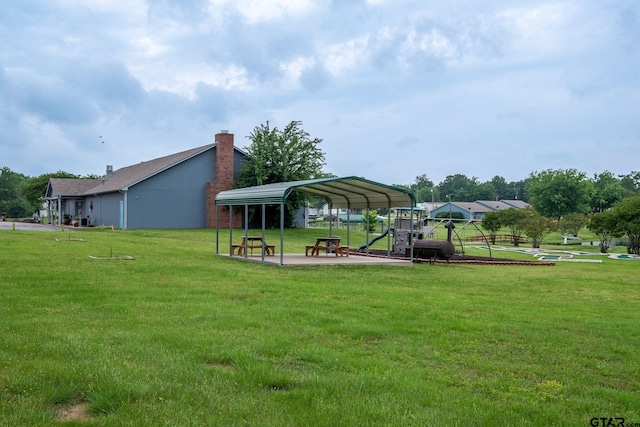 surrounding community featuring a playground and a lawn