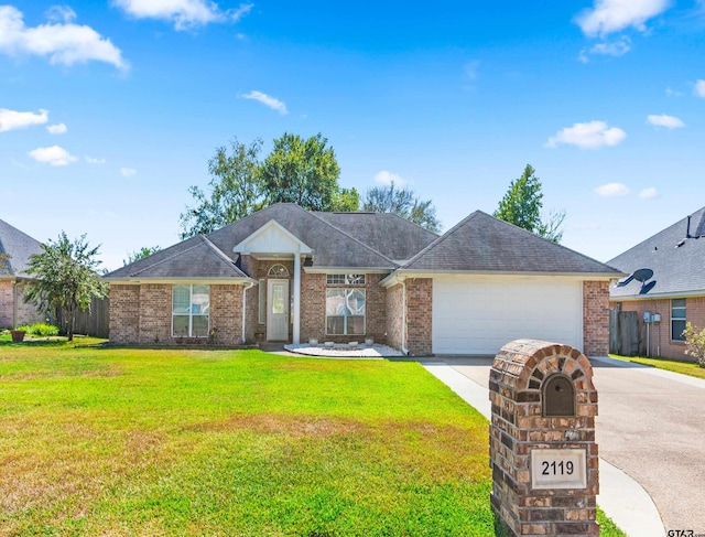 ranch-style home with a garage and a front lawn