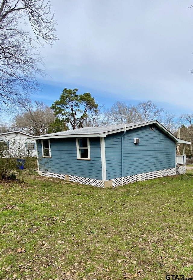 view of home's exterior featuring a yard